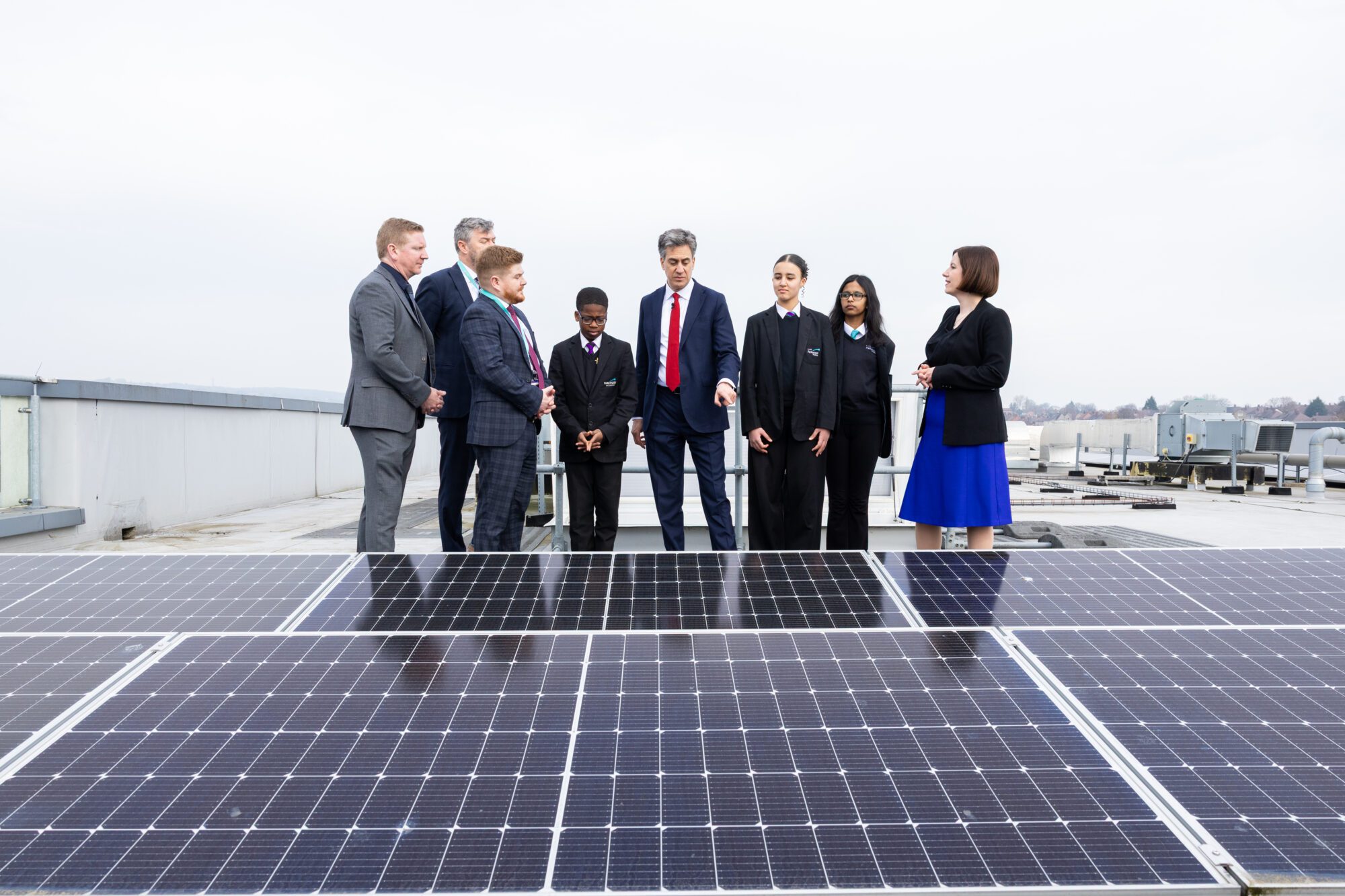 Ed Milliband in front of a solar panel as part of GB energy push