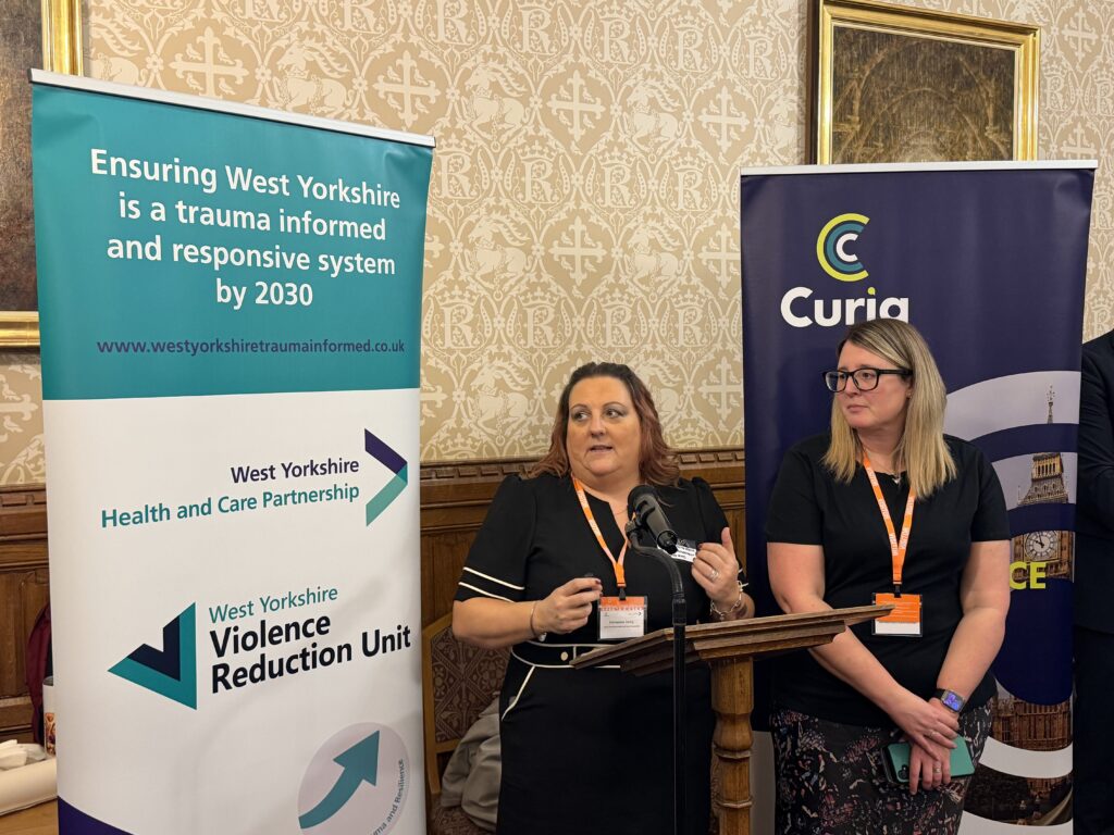 Head of Population Health at West Yorkshire Health and Care Partnership, and organiser of the Parliamentary event, Emmerline Irving and Senior Programme Delivery Manager at West Yorkshire Violence Reduction Partnership, Kelly Laycock presented West Yorkshire’s trauma informed and trauma responsive journey, highlighting how partnership working, violence reduction, lived experience and population health approaches are helping to drive system wide change.